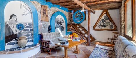 Televisión, chimenea, estéreo