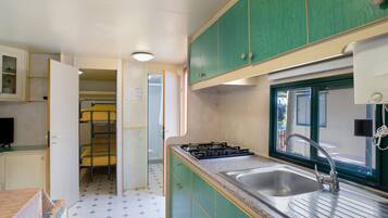 Fridge, stovetop, cookware/dishes/utensils