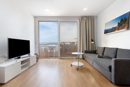 TV. Vacation Apartment 'Suite Playa Y Mar - Sea View' with Balcony, Wi-Fi and Air Conditioning