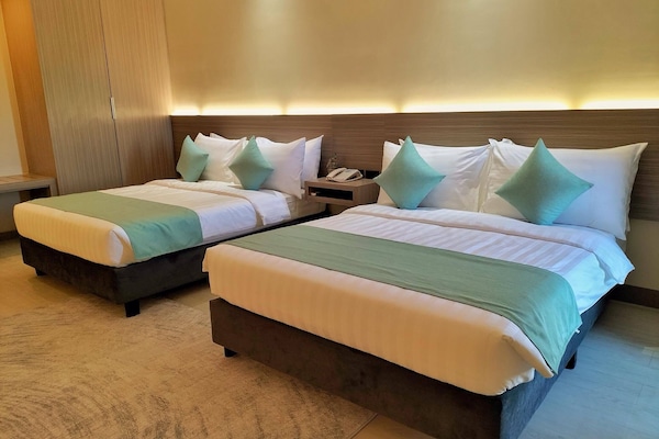 Deluxe Double Room, 2 Double Beds | Laptop workspace, free WiFi, bed sheets
