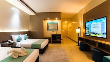 Habitación Deluxe doble, 2 camas dobles | Espacio para trabajar con un portátil, wifi gratis, ropa de cama