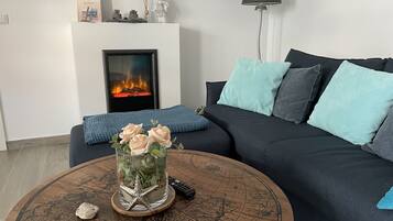 Fernseher, Kamin