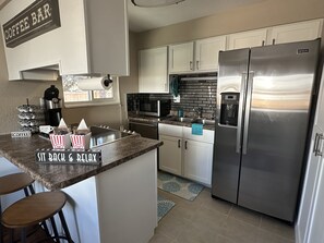 Microwave, oven, stovetop, dishwasher - Newly Renovated ski themed home with brand new furniture (Arvada)