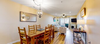 The Palms water-view condo near beach with outdoor pool, streaming, balcony, AC