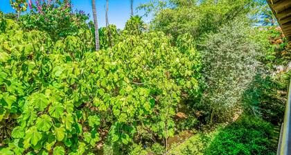 Garden view corner condo with wraparound lanai & pool, walk to Poipu beaches
