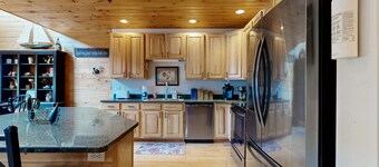 Ski-view condo with lake access & private hot tub - walk to dining/attractions