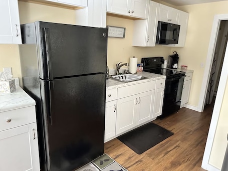 Fridge, microwave, coffee/tea maker, toaster. Beautiful two bedroom cabin with full kitchen and outdoor space