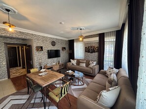 Comfort-Apartment, Stadtblick | Wohnbereich