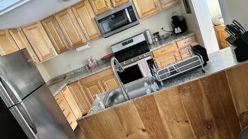 Fridge, microwave, coffee/tea maker, toaster