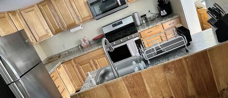 Fridge, microwave, coffee/tea maker, toaster