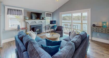Stunning lakefront home with kayaks, games, & amazing deck views - dog-friendly