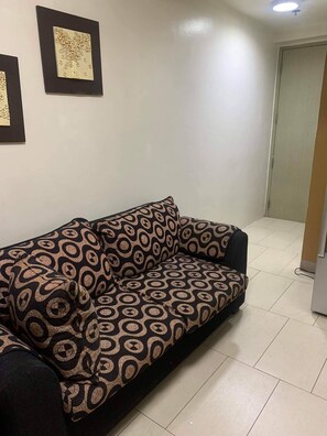 Living area - Cozy 2-bedroom condo with WiFi, with affordable price. (Makati)