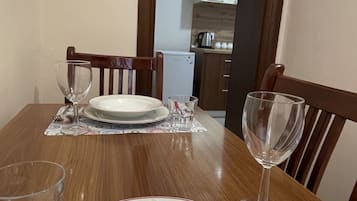 Comfort Apartment, Non Smoking, Kitchen | Living area | Flat-screen TV