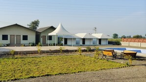 Unclassified image, 5 of 12, button - Somnath Inn (Garudeshwar)