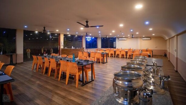 Unclassified image, 1 of 12, button - Somnath Inn (Garudeshwar)