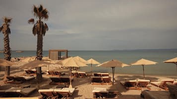 On the beach, free beach shuttle, free beach cabanas, sun loungers