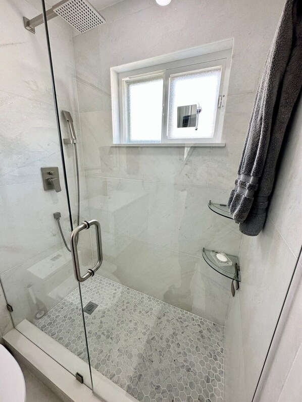 Shower, hair dryer, shampoo