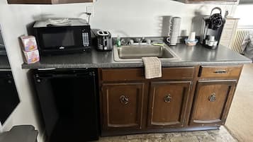 Fridge, microwave, coffee/tea maker, toaster