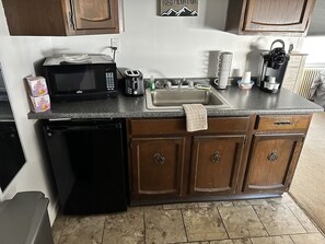 Fridge, microwave, coffee/tea maker, toaster