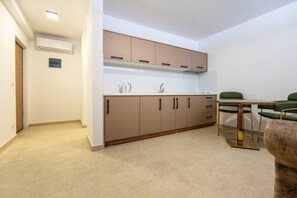 Fridge, stovetop, cookware/dishes/utensils