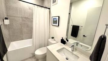 Hair dryer, towels, soap, shampoo