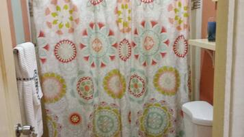 Shower, towels, soap, shampoo