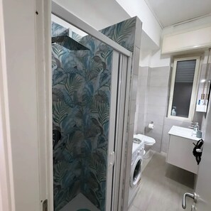 Hair dryer, bidet, towels, soap