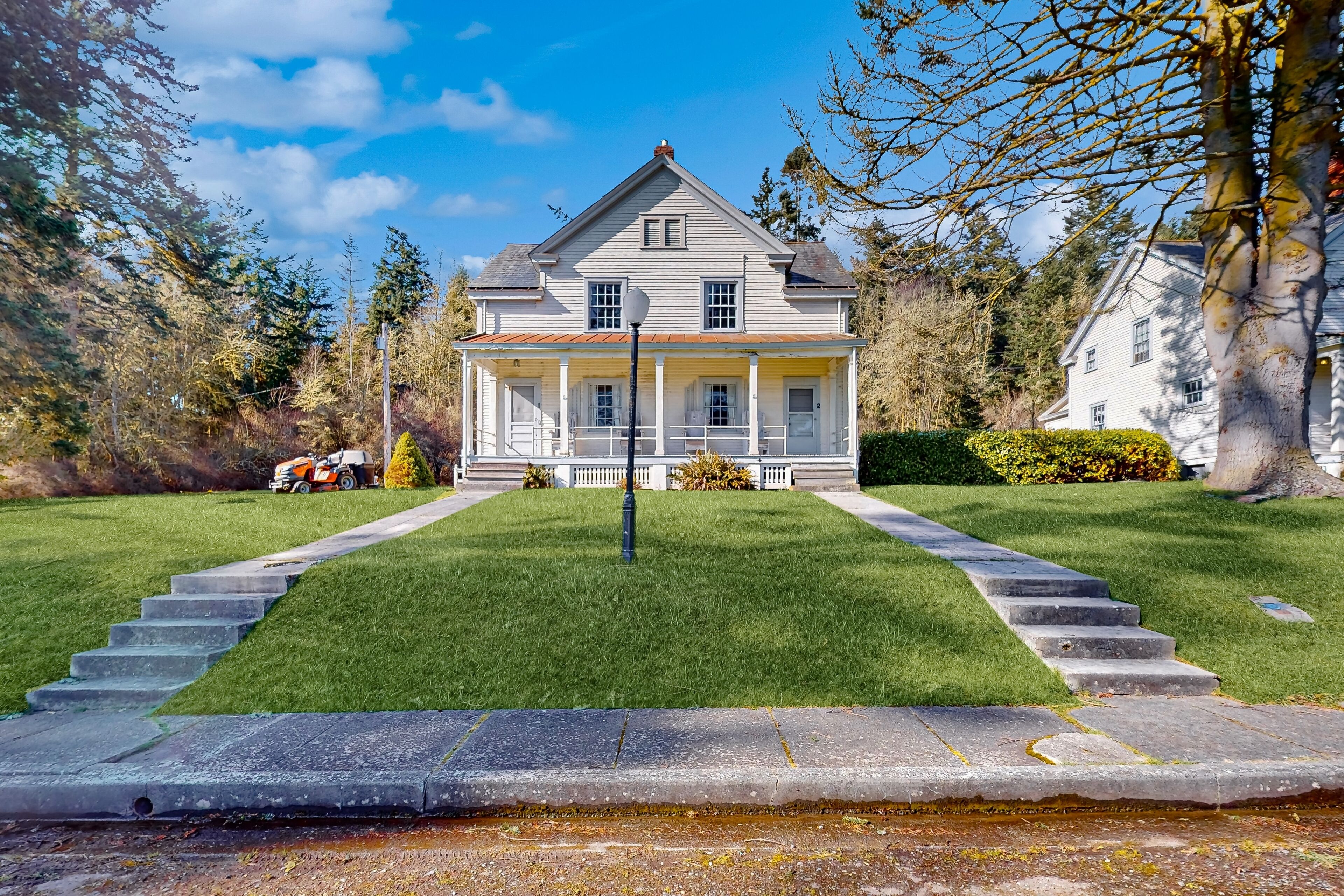 Duplex home with front porch & Admiralty Bay view, steps to Fort Casey SP