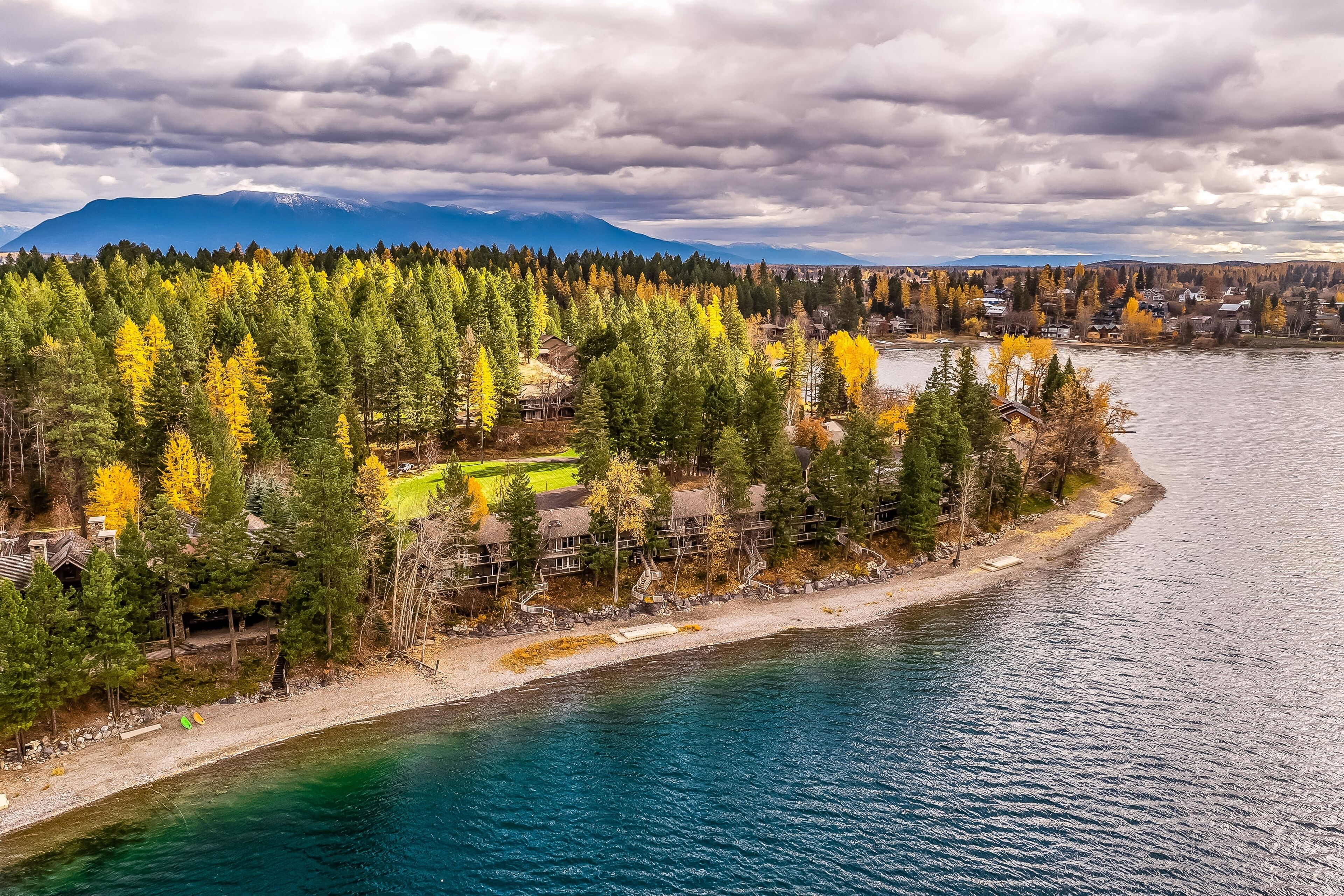 Dog-friendly condo with lake views, private balcony, hot tub, & pool