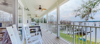 Lakefront home with amazing sunset/water view, private dock, & firepit