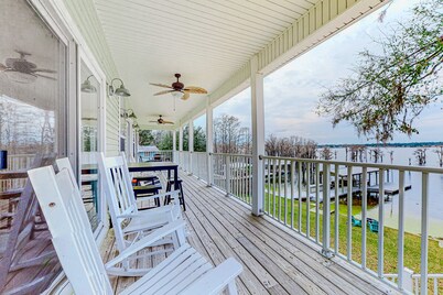 Lakefront home with amazing sunset/water view, private dock, & firepit