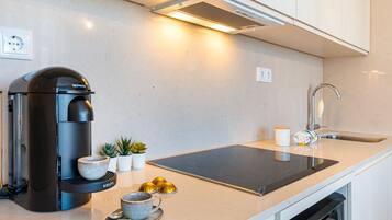 Fridge, microwave, stovetop, coffee/tea maker