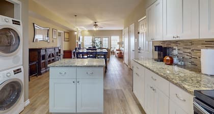 Waterfront community condo with on-site pool, water views, & private patio