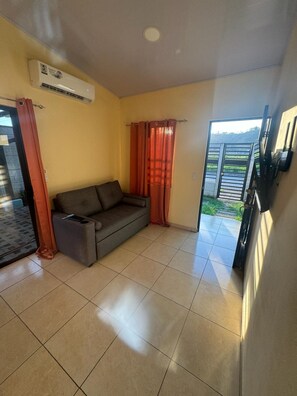 Living area - Discover beachfront bliss in Jaco (Quebrada Bonita)