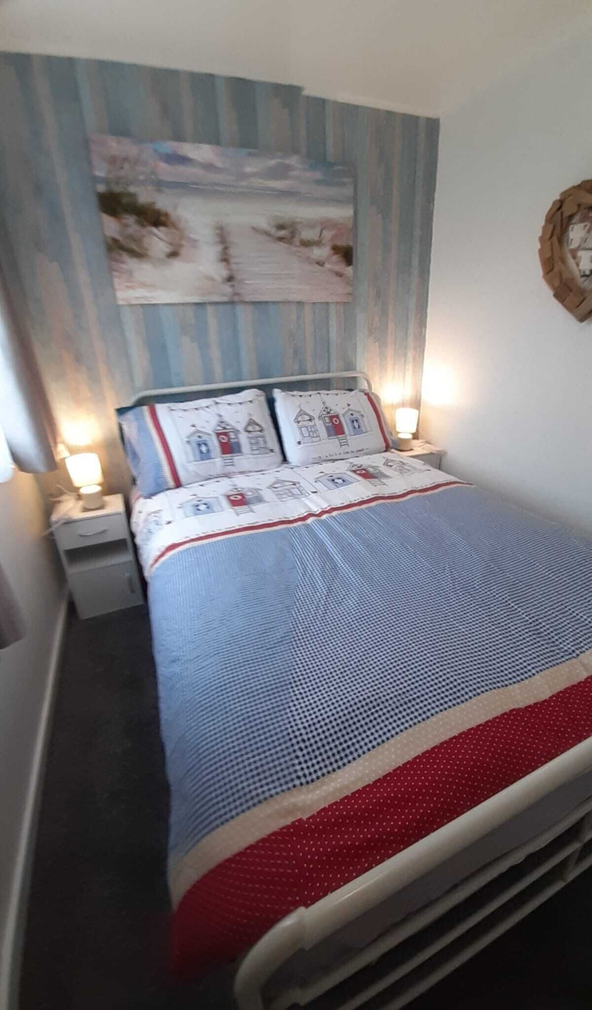 2 dormitorios, tabla de planchar con plancha, wifi gratis y ropa de cama