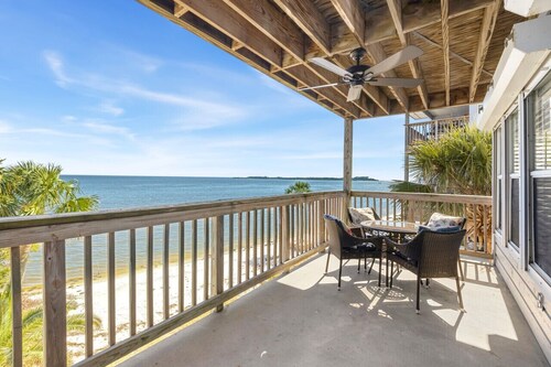 Waterfront condo with king bed and large sunrise deck