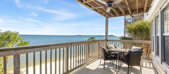 Waterfront condo with king bed and large sunrise deck