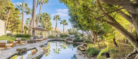 Outdoor pool, pool umbrellas, sun loungers