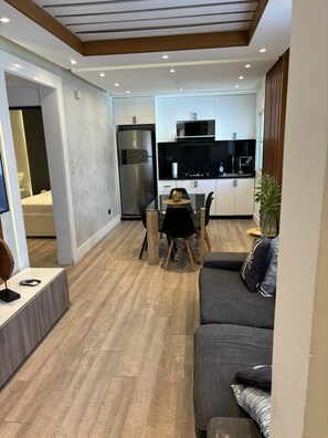 Appartement Confort | Coin séjour | Télévision à écran plat