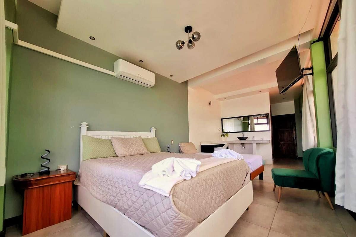 Premium Triple Room, Partial Lake View | 1 bedroom, premium bedding, down comforters, individually decorated