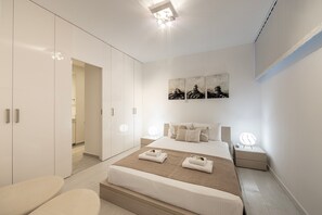 5 chambres, coffres-forts dans les chambres, fer et planche à repasser
