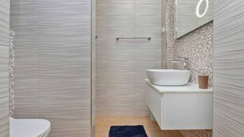 Shower, hair dryer, towels