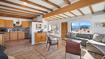 Smart TV, fireplace, foosball, books