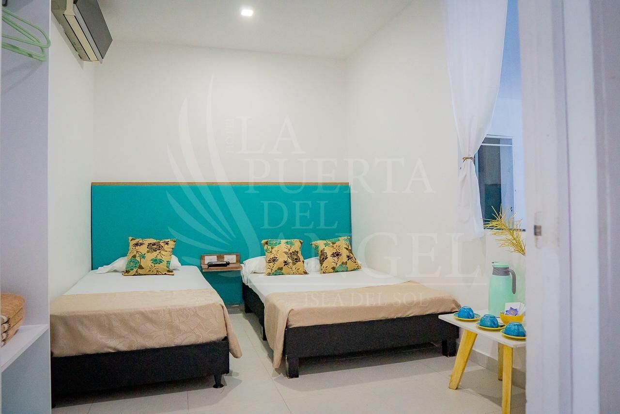 Comfort Triple Room, Courtyard View | Down comforters, individually decorated, individually furnished