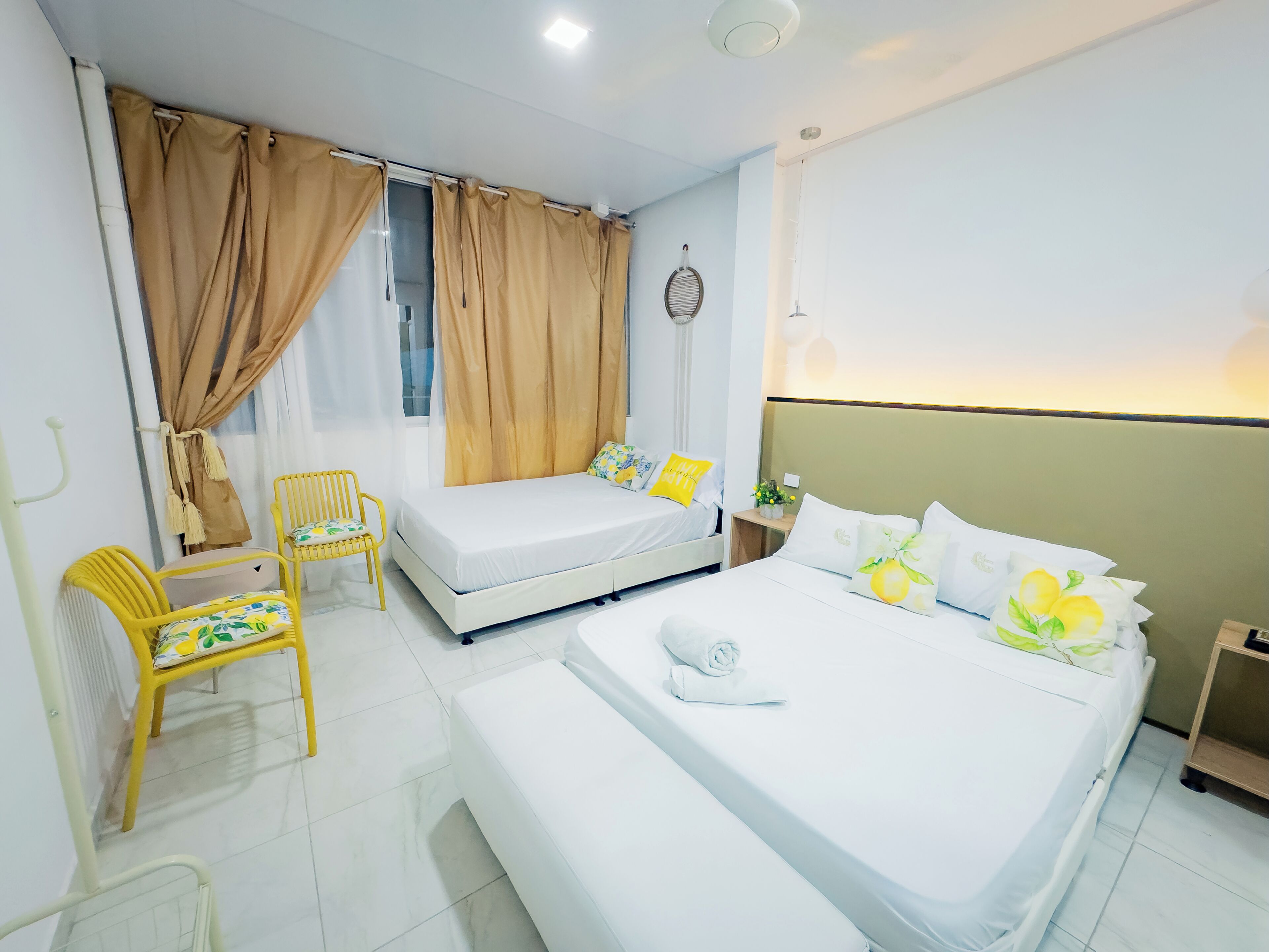 Economy Quadruple Room | Down comforters, individually decorated, individually furnished