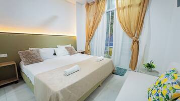 Honeymoon Double Room | Down comforters, individually decorated, individually furnished