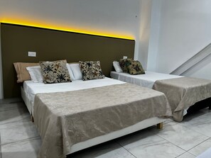 Economy Quadruple Room | Down comforters, individually decorated, individually furnished - La Puerta del Angel Isla  Club (Ricaurte)
