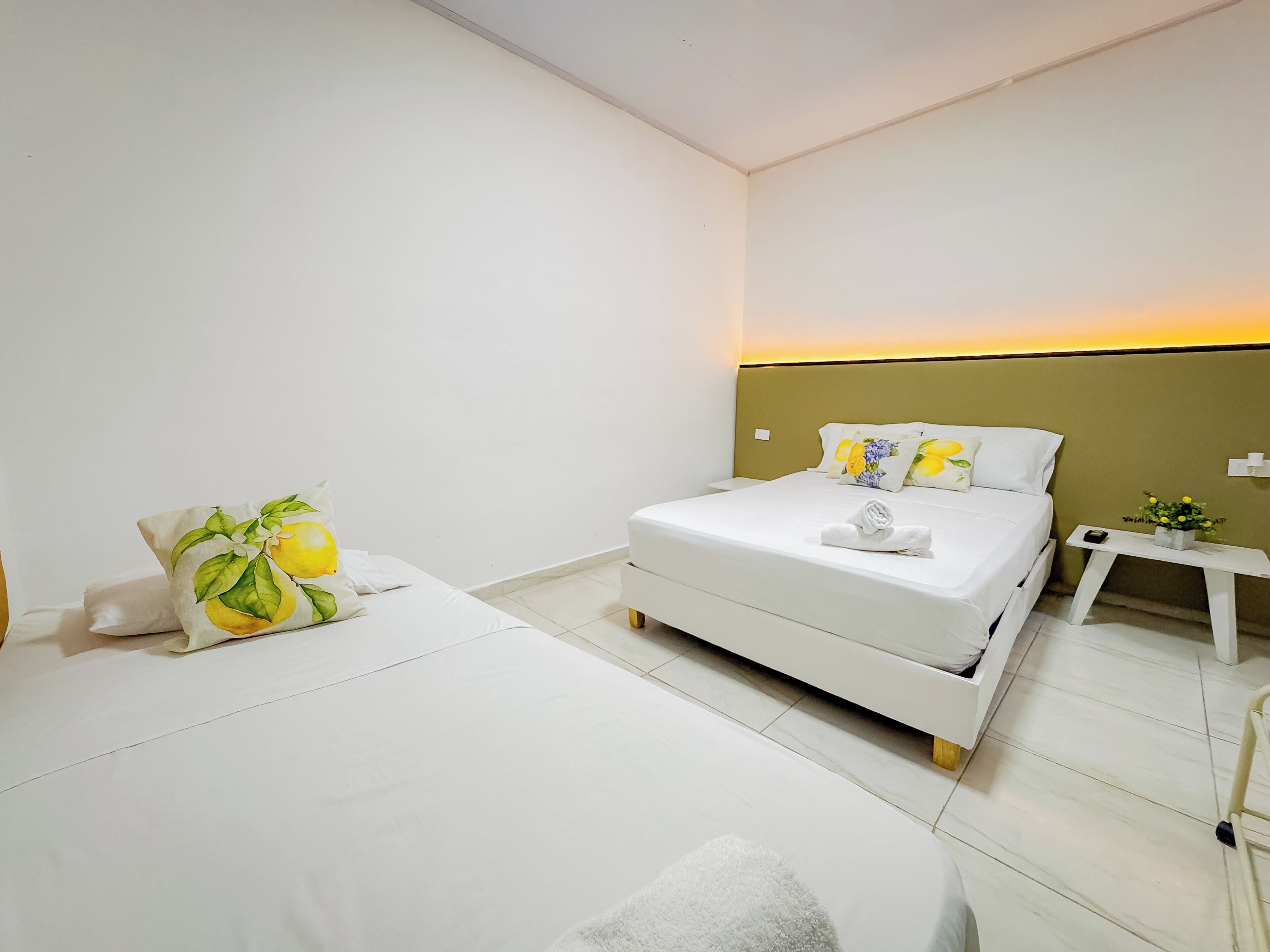 Family Triple Room, Multiple Beds | Down comforters, individually decorated, individually furnished