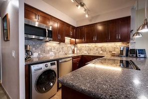 Fridge, microwave, oven, stovetop - Ma'alaea Banyans Unit 209 - Direct Oceanfront View - Split AC in Living Room and Bedroom (Wailuku)