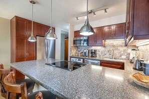Fridge, microwave, oven, stovetop - Ma'alaea Banyans Unit 209 - Direct Oceanfront View - Split AC in Living Room and Bedroom (Wailuku)